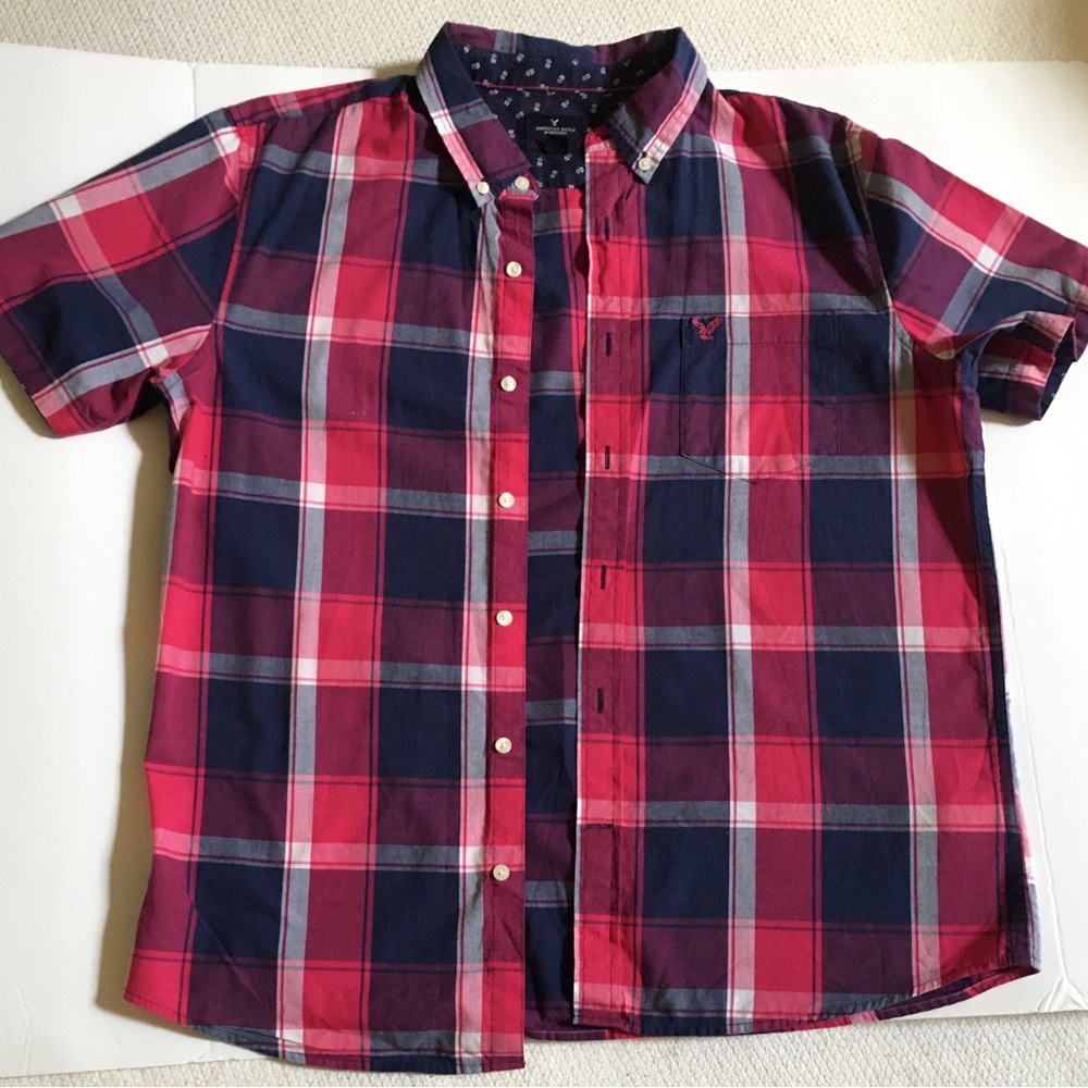Great quality boys Plaid shirt. No holes or tears
